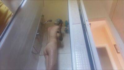 hidden cam: my m. still has not noticed the hidden cam in the bathroom, so I continue to spy on her even while she is taking a shower - xxxfiles.com